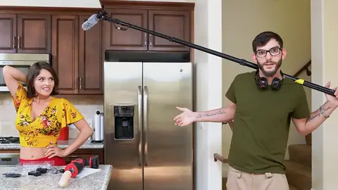 Preparing to screw the dark-haired babe with a machine