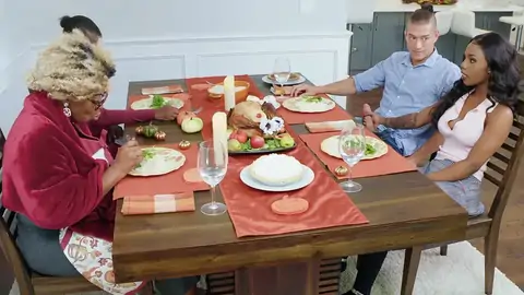 Tattooed ebony fuckslut is riding a BWC by the table