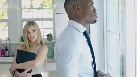 Blue-spotted blondie giving a oral pleasure to a black hard-on