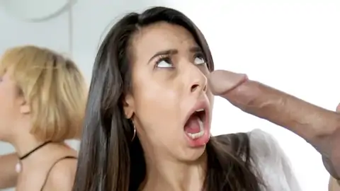 Black-haired and a light-haired are sharing stiff-ons in a 4-way